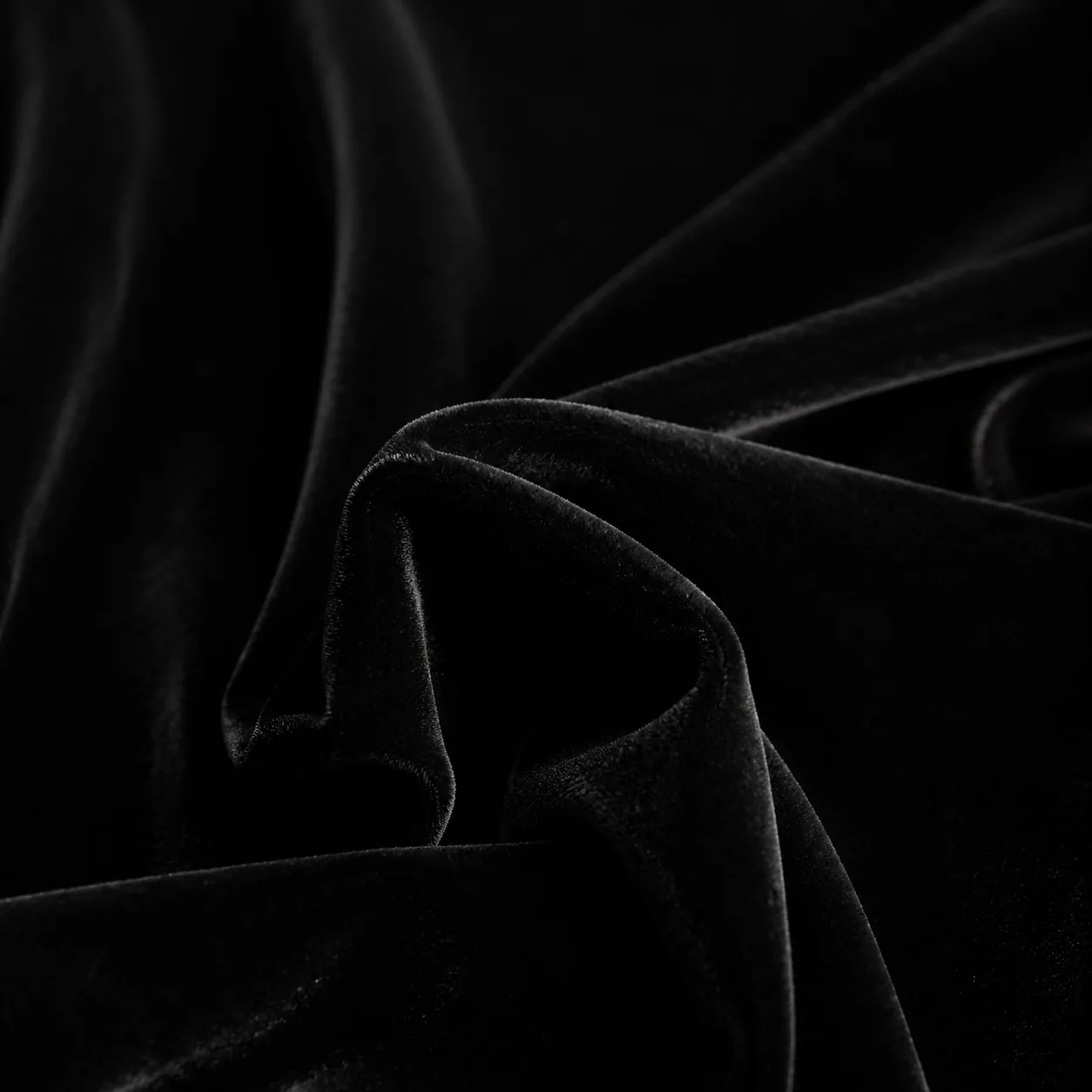 Black velvet flocking cloth draped with soft folds