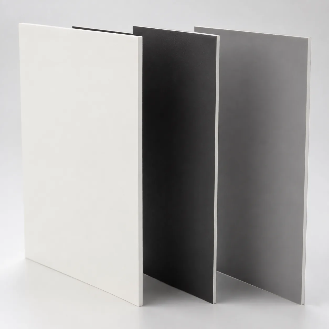 Three PVC backdrop boards in white, black and gray
