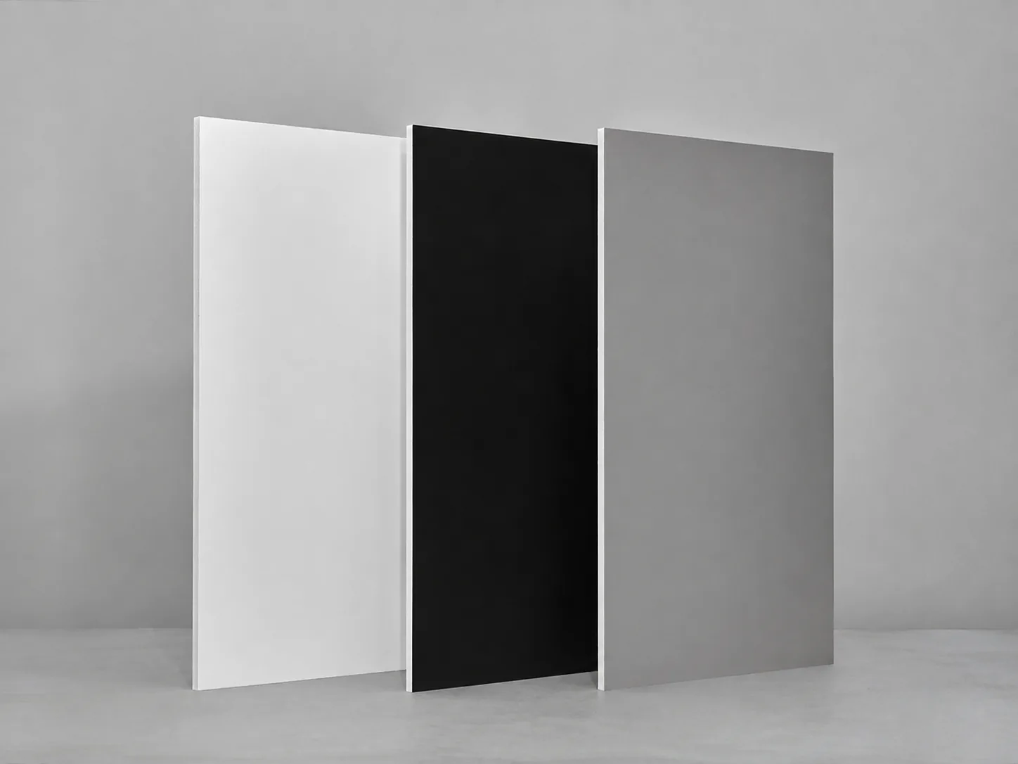Three PVC backdrop boards in white, black and gray
