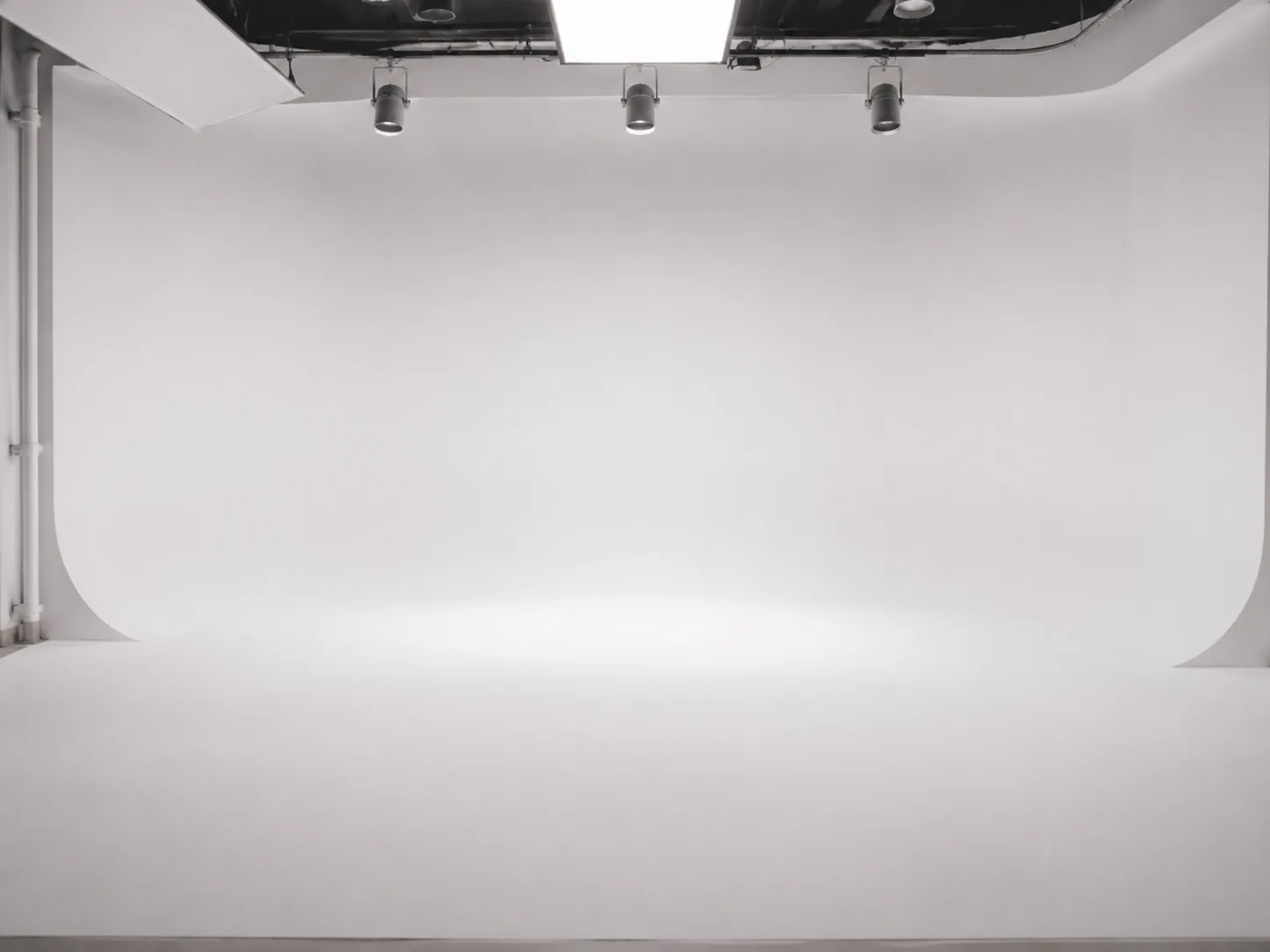 Seamless white paper forming a smooth join-free curve in a studio